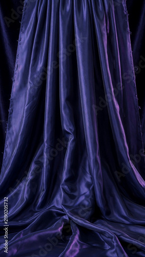 Indigo silk drape with deep vertical folds
