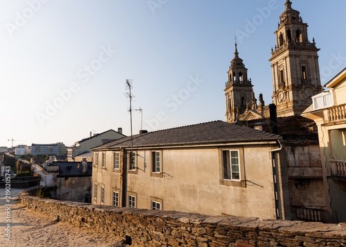 Bild auf Leinwand Historic Cityscape with Cathedral Towers and Old Buildings, Lugo, Spain