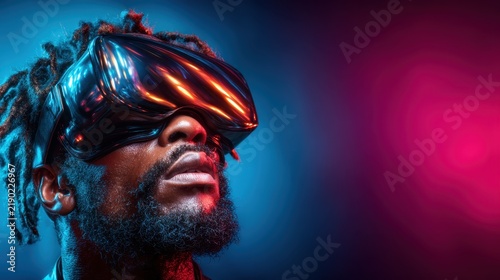 A dynamic portrait of a man immersed in virtual reality, captured against a vibrant, colorful background that enhances the futuristic and exploratory spirit of technology.