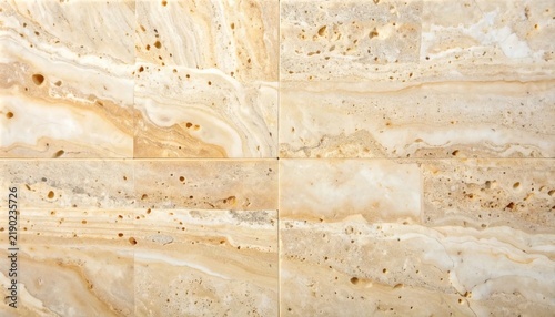 Warm neutral beige travertine limestone texture background featuring smooth porous natural stone surface pattern suitable for minimalist interior architecture design walls and floor tiles.