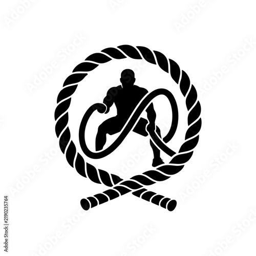 Black athlete with battle ropes in rope frame on a white background.