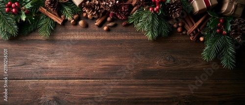 Christmas decorations on rustic wooden background