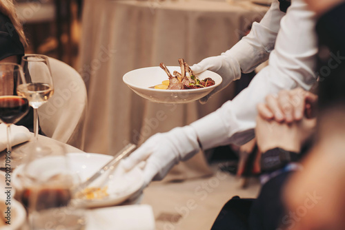 Elegant catering service at a luxurious banquet showcasing exquisite culinary delights