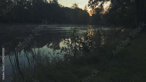 Morning fog during sunrise on the lake.