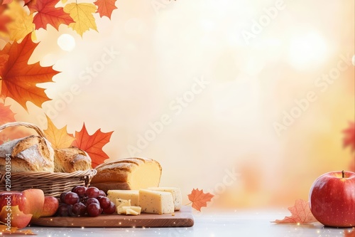 A cheerful Canadian Thanksgiving banner with maple leaves, bread, apples, and cheese on a warm autumn gradient. Perfect for festive fall and harvest celebrations.