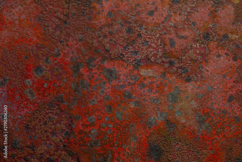 Obraz na plátne Abstract copper texture with red-orange oxidation, dark corrosion and layered patina