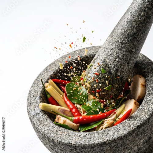 Vibrant chili and herbs prepare traditional mortar for fragrant
