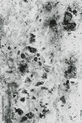Abstract White Crystalline Rock Texture with Dark Mineral Cavities