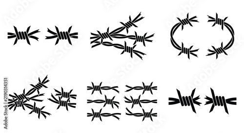 Barbed wire silhouettes depict security fencing and restrictive boundaries