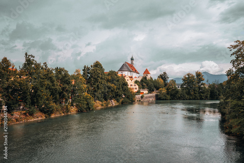 Church at a river in Füssen