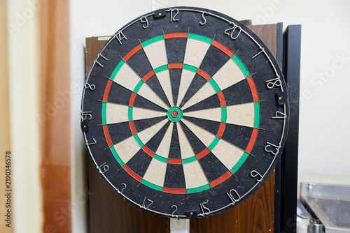 Bild auf Leinwand Dartboard Mounted Indoors for Competitive Leisure Games and Sports