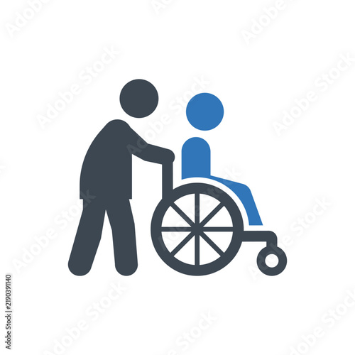 Caregiver pushing person in wheelchair during outdoor daytime with clear sky and white background