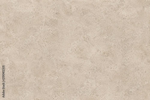 Beige concrete texture background with subtle grain, neutral stone cement surface, minimalist sand-colored wall backdrop for interior designers and architects