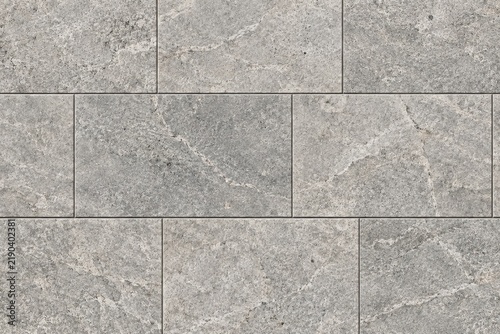 Natural grey stone tile texture with seamless granite paving blocks and architectural limestone floor pattern for exterior design backgrounds