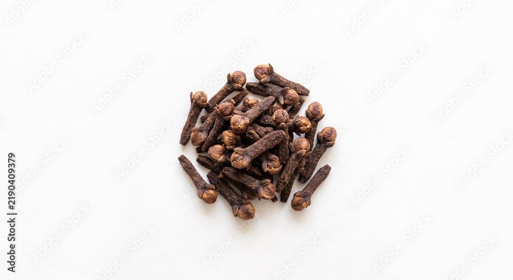 Fototapeta premium Natural organic clove spice buds for dental care, mulled wine, and traditional medicine