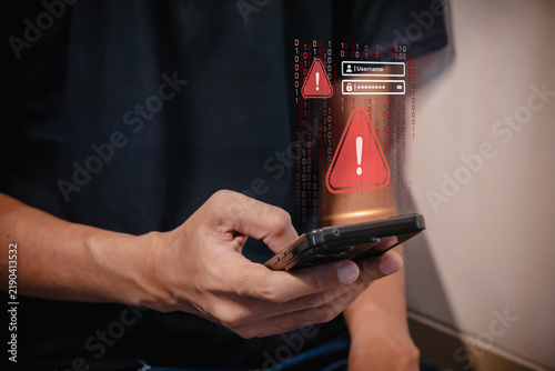 Foto A digital waning alert and login field on a smartphone screen, representing a cy