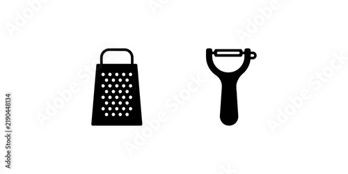 Quadro su tela Kitchen tools grater and peeler for cooking and food preparation.