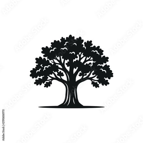 Majestic Oak Tree Silhouette with Lush Foliage and Strong Trunk.