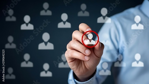 A businessman selecting a specific person from a group of digital human silhouettes to represent human resources recruitment and talent management