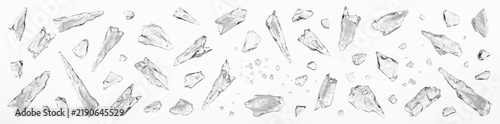 The scene shows various pieces of ice arranged on a clean white background. These pieces can be used for Christmas decorations or themed projects during the holiday season