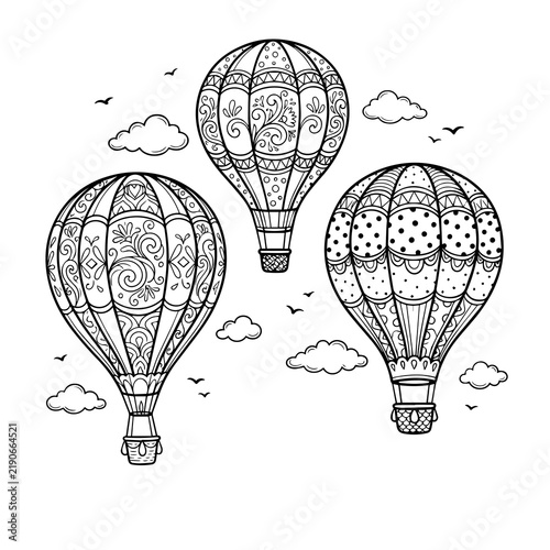Ornate hot air balloons with intricate doodle patterns flying among clouds