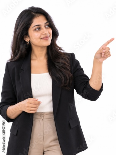 Businesswoman pointing to the side with a smile