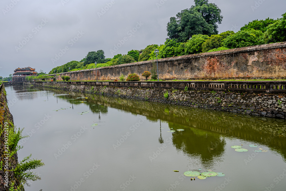 Fototapeta premium Moat and fortress walls of the Imperial City in Hue