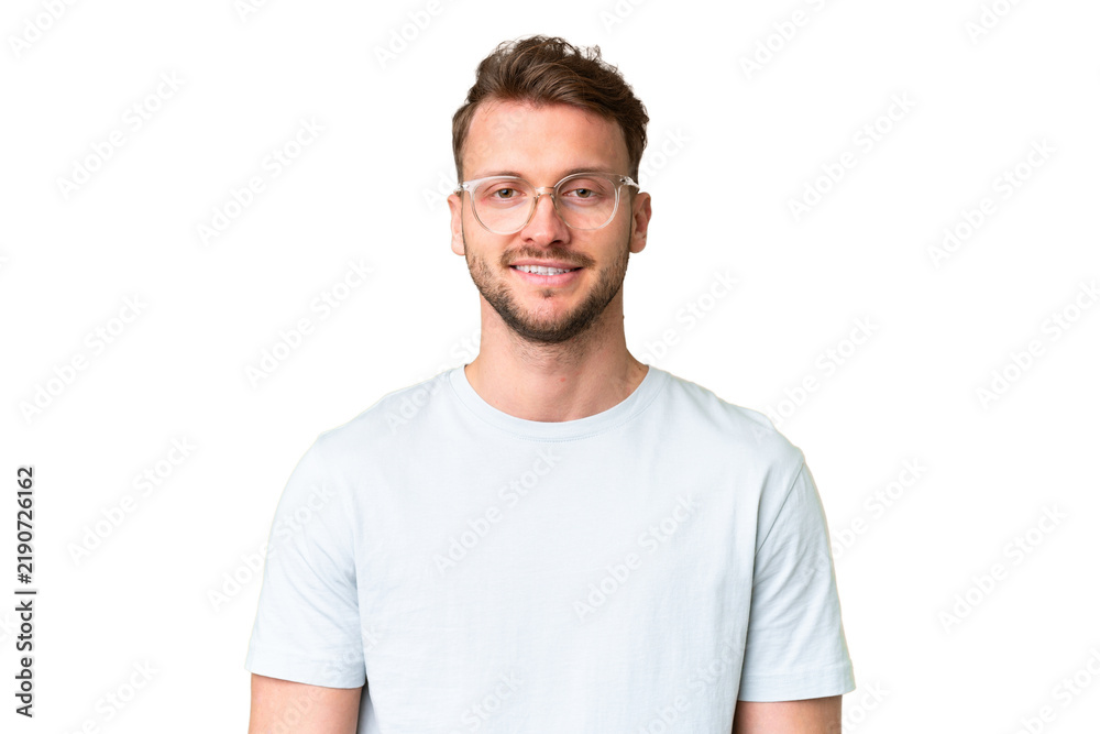 Fototapeta premium Young handsome caucasian man over isolated chroma key background With glasses with happy expression