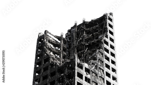Fotografie Ruined concrete skyscraper with collapsed floors and exposed rebar, isolated on