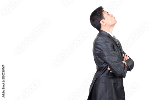 Принти на полотні Side view of man in suit with crossed arms and looking away with discontent face