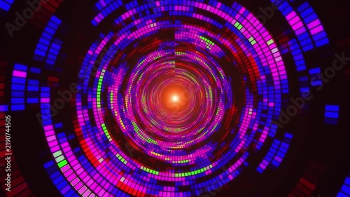 A futuristic digital tunnel portal formed by concentric rings of bright, glowing squares. Red, blue, pink, and green segments create an effect of movement, depth, and virtual space. 4K animation.
