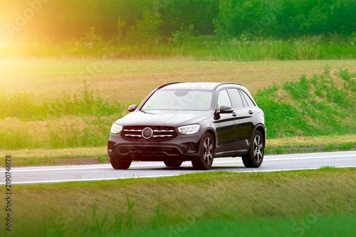 Obraz na płótnie Modern crossover car on scenic rural route