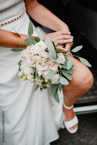Fotografie Bridal bouquet with shoe as wedding decoration