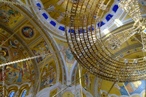Obraz na płótnie Chandelier with gold Cyrillic inscriptions inside the Church of Saint Sava in Belgrade, Serbia