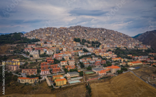 Sunset panoramic view of the rooftops of Gangi . Sicily, Italy. August 2024. Aerial drone picture.