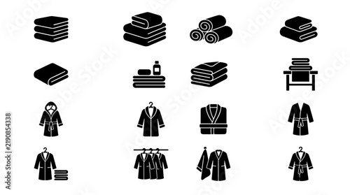 Collection of black and white icons representing towels and bathrobes for spa and bathroom use