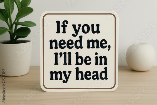 Sign featuring a humorous quote about retreating into one's thoughts, resting on a wooden shelf, perfect for introspective decor, AI generated