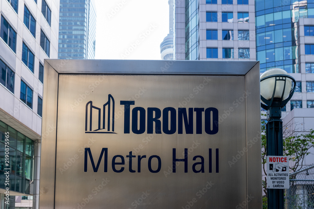 Obraz premium Toronto, Ontario, Canada -September 13, 2026: Closeup Toronto Metro Hall sign on John Street in downtown Toronto, Ontario, Canada. 