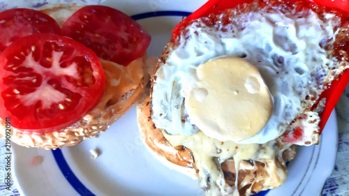 Burger making, culinary. Modern color photo.