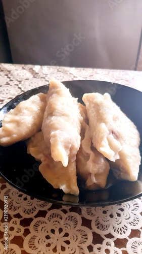 A delicious lunch on a plate, steaming. Modern color photo, new.
