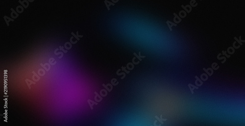 Abstract dark background with soft glowing purple and blue light leaks and grainy texture