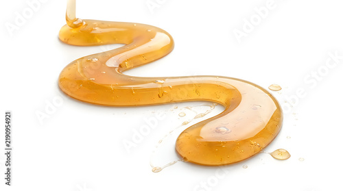 Golden syrup dripping on clean surface