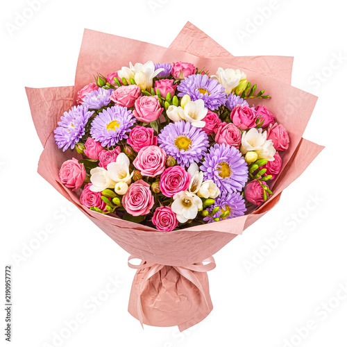 Vibrant bouquet of pink roses, white freesias, purple asters, peach paper wrap