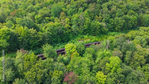 Summer aerial view featuring the 3.4 mile long wooden penstock in Vermont known as The Snake that runs from the Searsburg Dam to a generating station along the Deerfield River with an 8 foot diameter