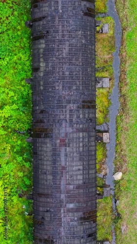 Summer aerial view featuring the 3.4 mile long wooden penstock in Vermont known as The Snake that runs from the Searsburg Dam to a generating station along the Deerfield River with an 8 foot diameter