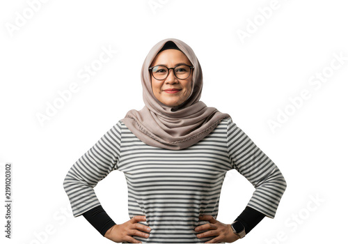 Smiling woman wearing striped sweater and hijab