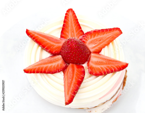 Sweet dessert with strawberries, on white, studio shot