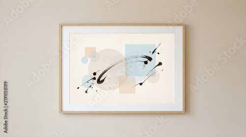 Abstract art print with black ink splashes in wooden frame