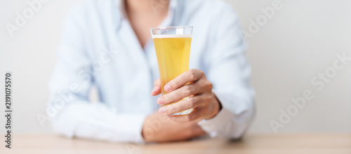 Принти на полотні man with glass of Beer on table, suffering from alcohol addiction and alcoholism concept