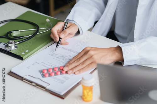 Doctor Explaining Prescription Treatment and Medication Use as Part of Professional Patient Care and Digital Healthcare Service.